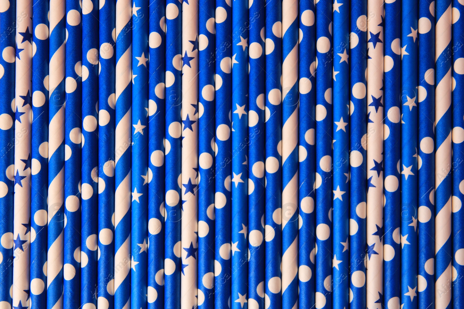 Photo of Many paper drinking straws as background, top view