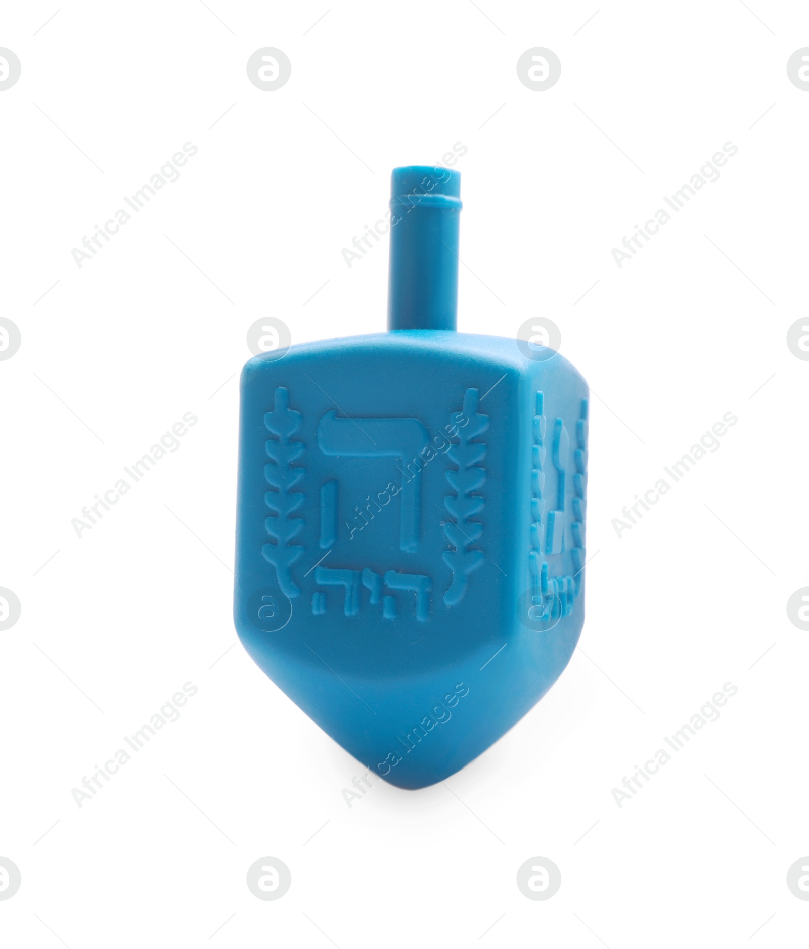 Photo of One light blue dreidel isolated on white. Traditional Hanukkah game