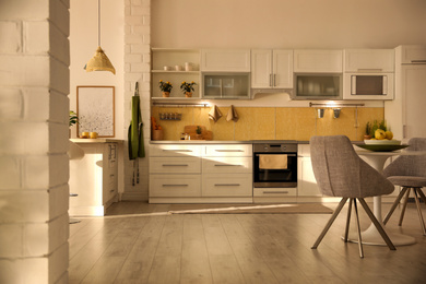 Modern kitchen interior with stylish white furniture