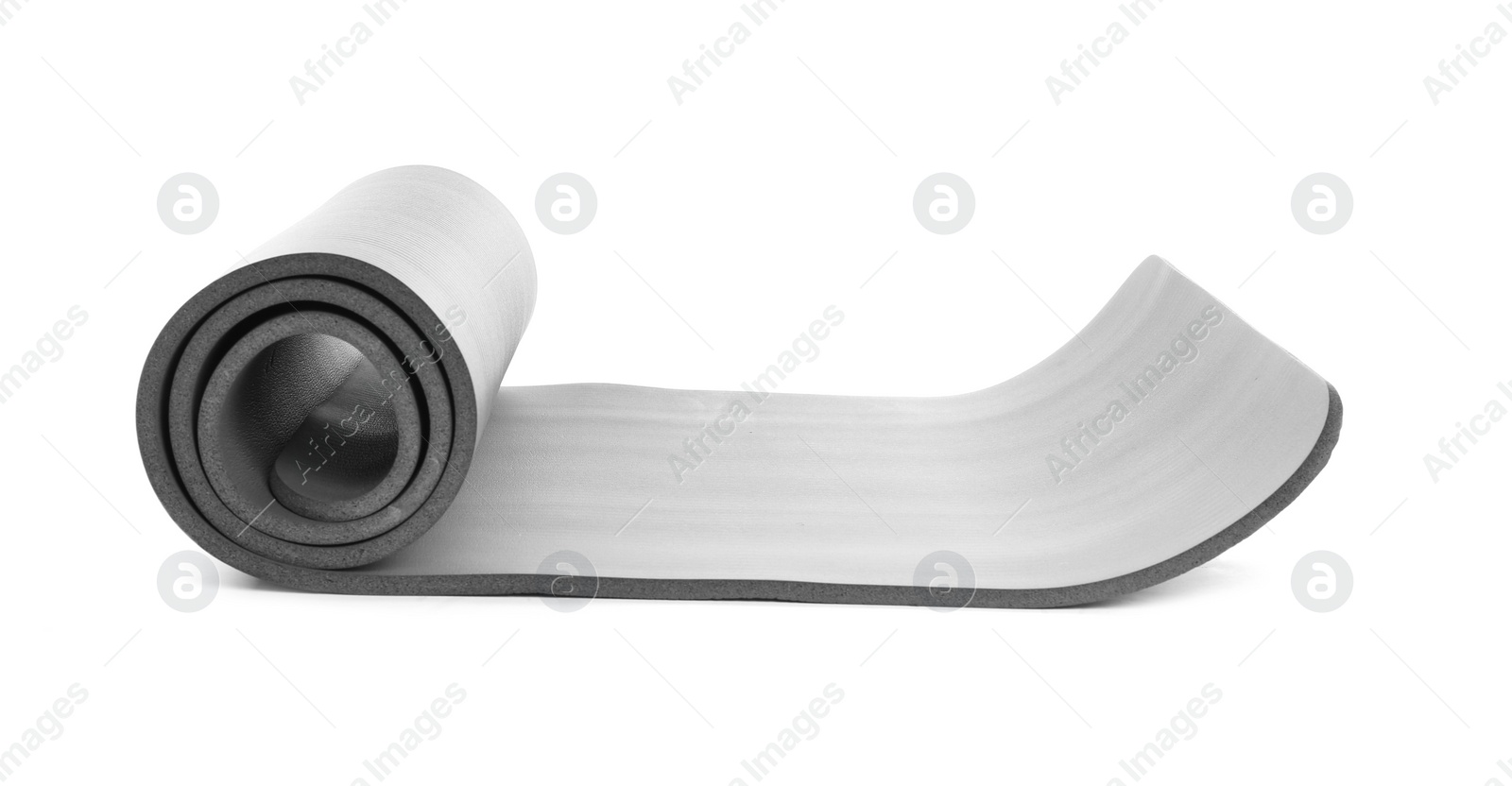 Photo of Rolled grey yoga mat on white background