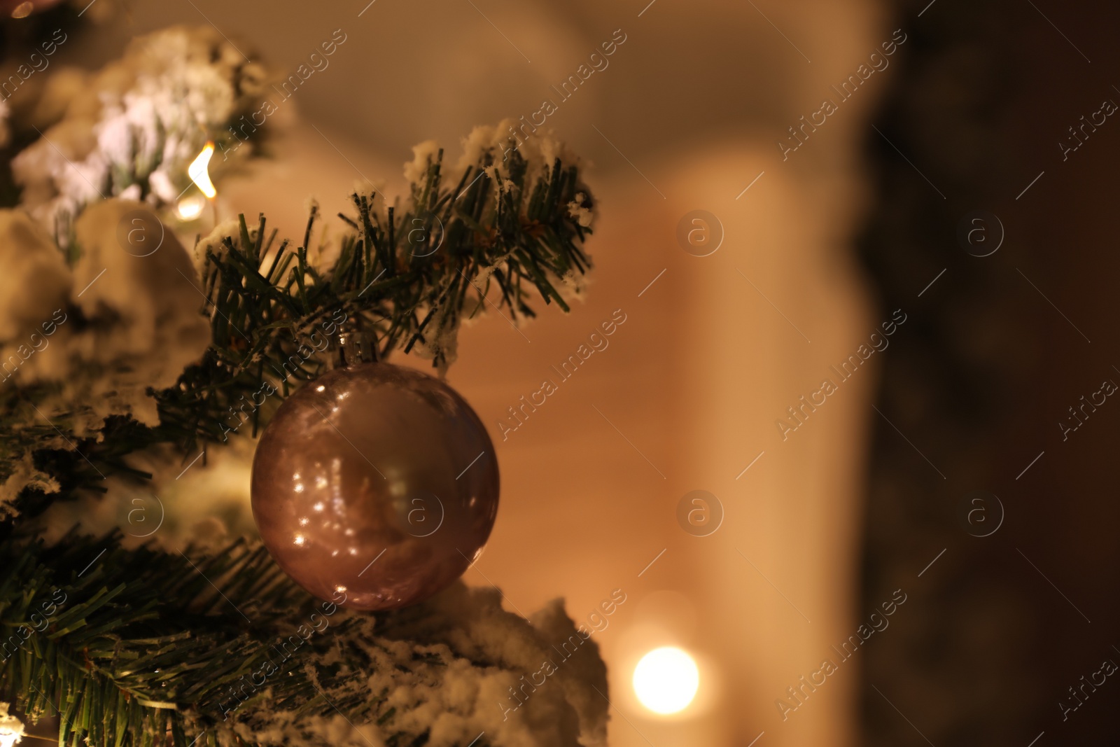 Photo of Closeup view of beautifully decorated Christmas tree indoors