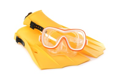 Photo of Pair of yellow flippers and mask on white background