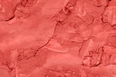 Photo of Texture of red lipstick as background, closeup