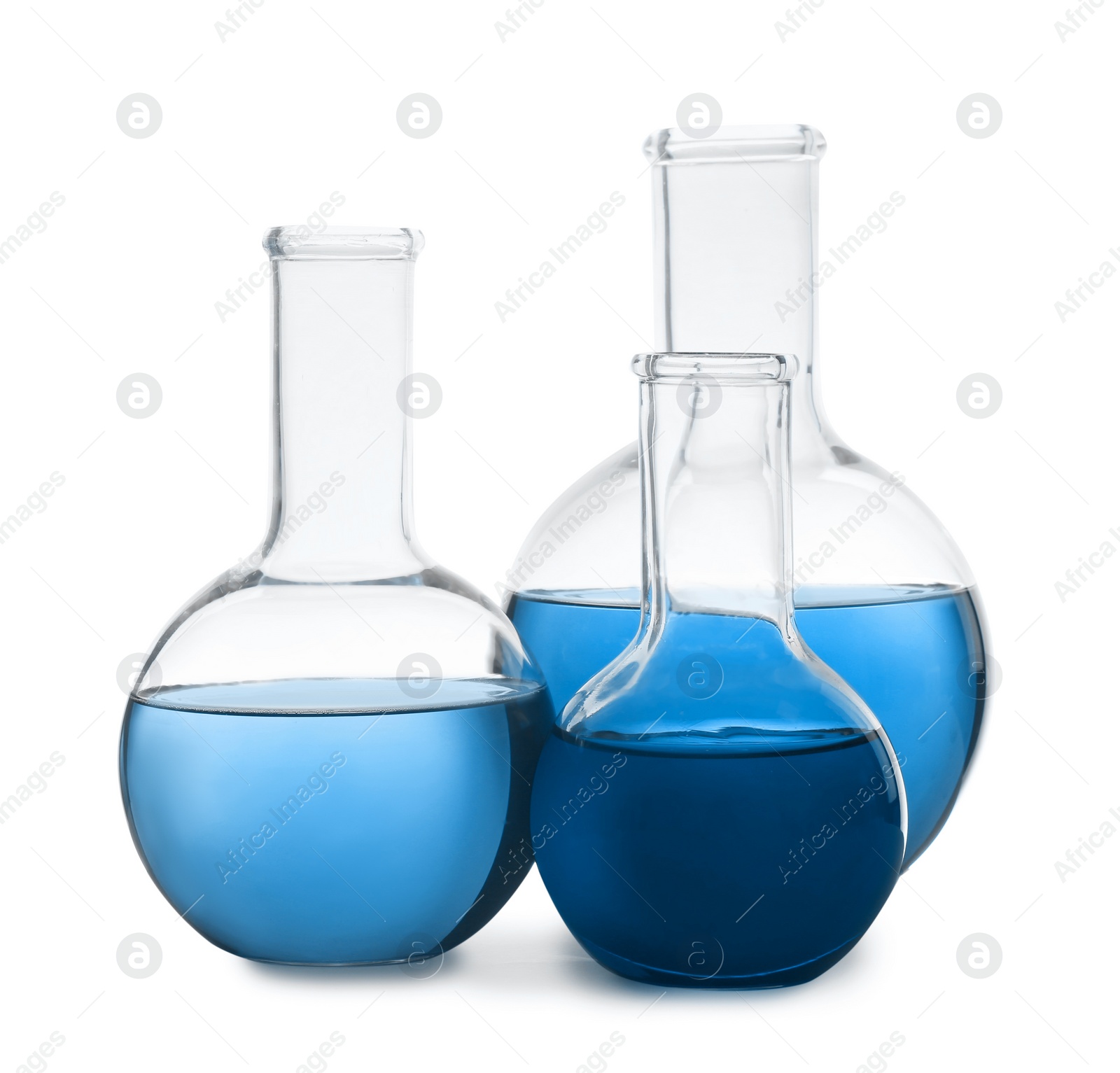 Image of Boiling flasks with blue liquid isolated on white. Laboratory glassware