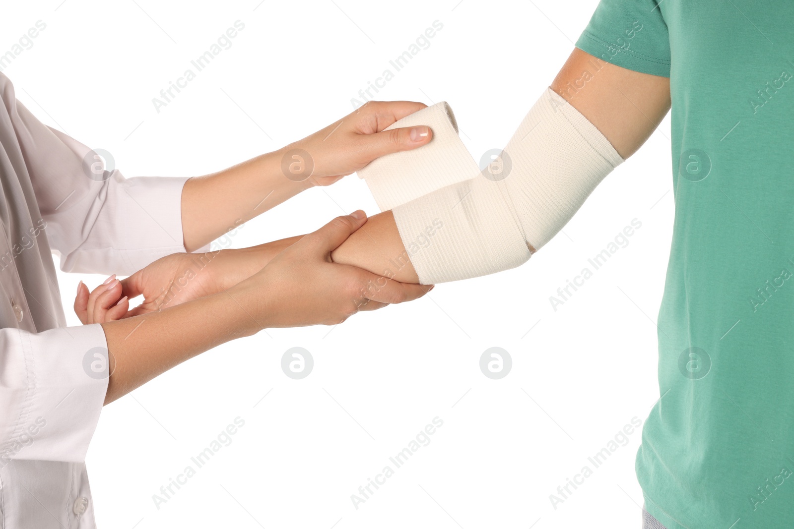 Photo of Doctor applying bandage onto patient's arm on white background, closeup