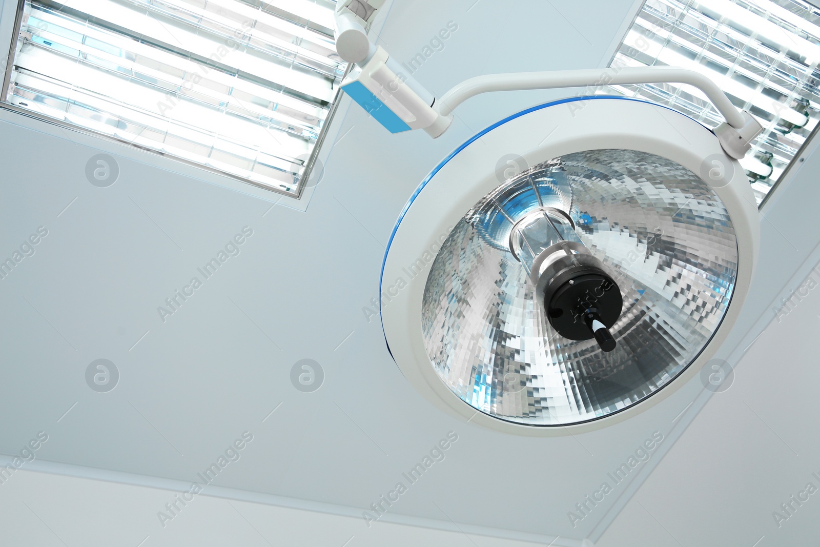 Photo of Powerful surgical lamp in modern operating room