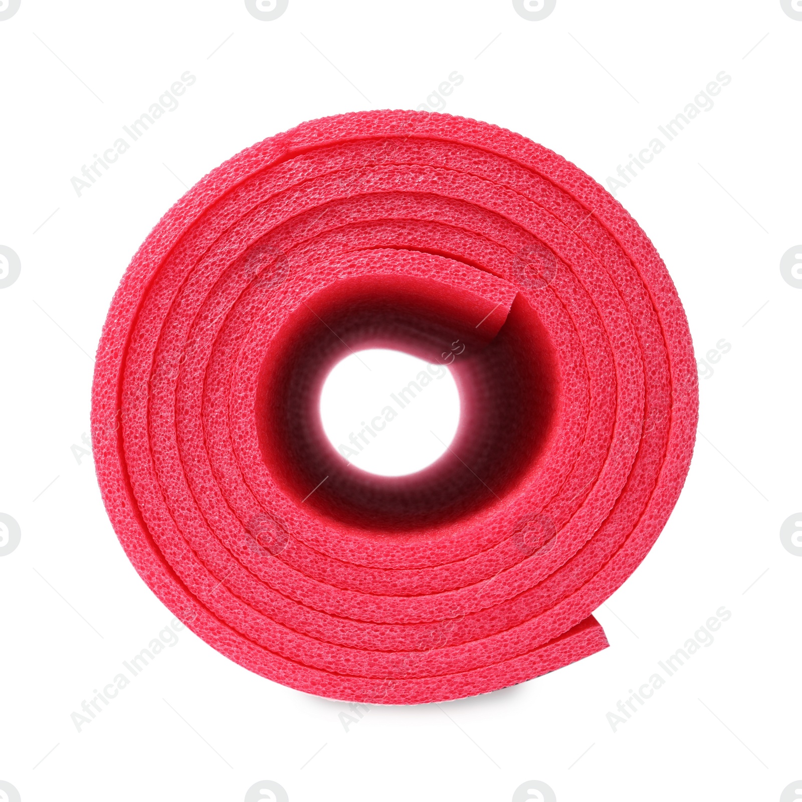 Photo of Rolled bright camping mat isolated on white