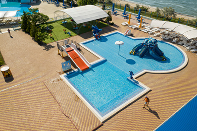 Aerial view of swimming pool on sunny day