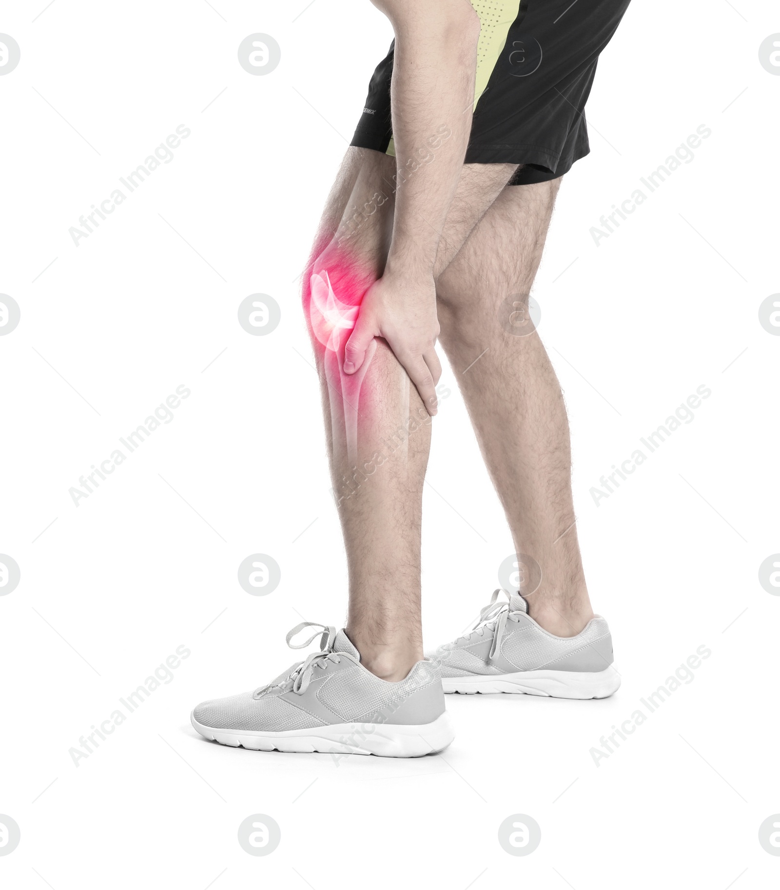 Image of Man suffering from knee pain on white background, closeup