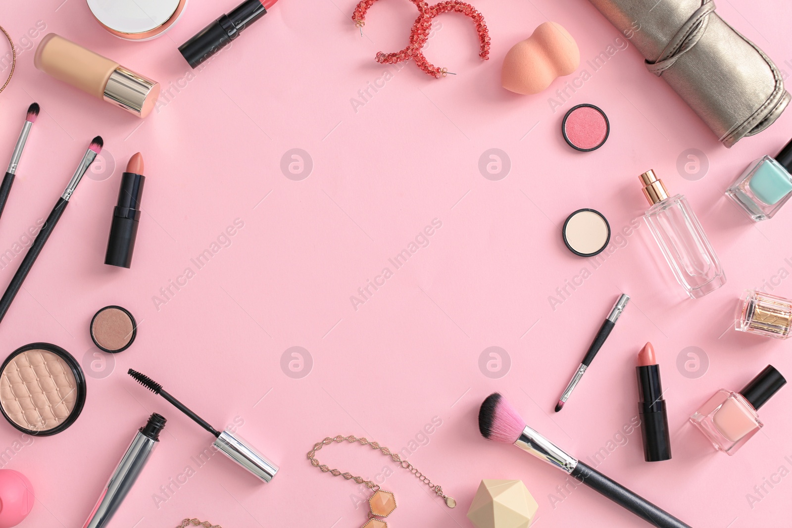 Photo of Flat lay composition with makeup products for woman on color background