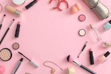 Flat lay composition with makeup products for woman on color background