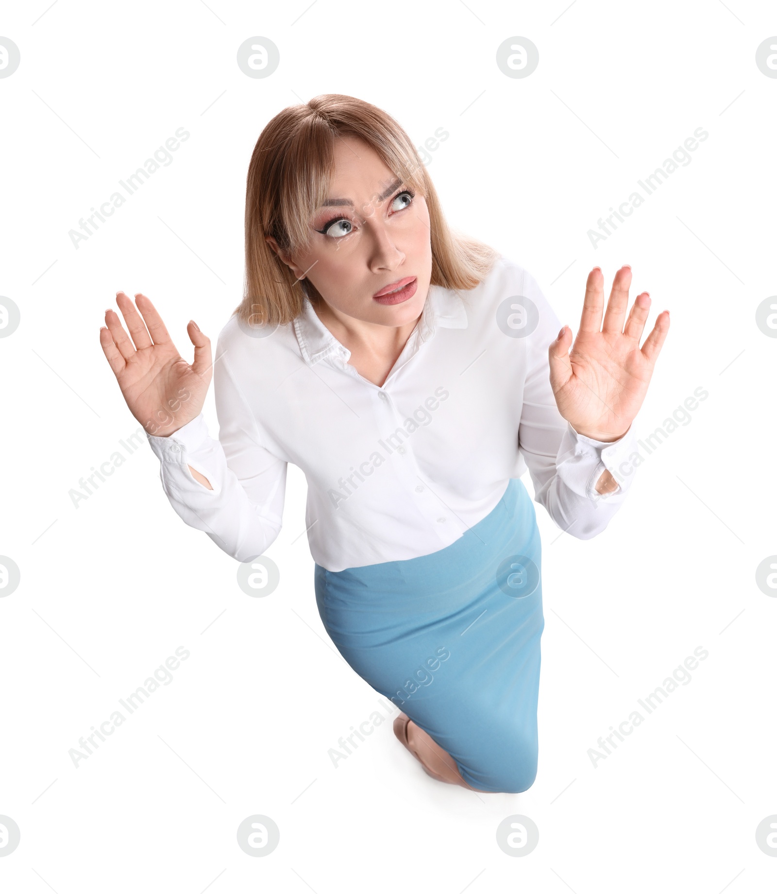 Photo of Young woman evading something on white background, above view