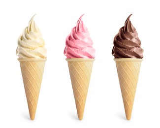 Set of different delicious soft serve ice creams in crispy cones on white background