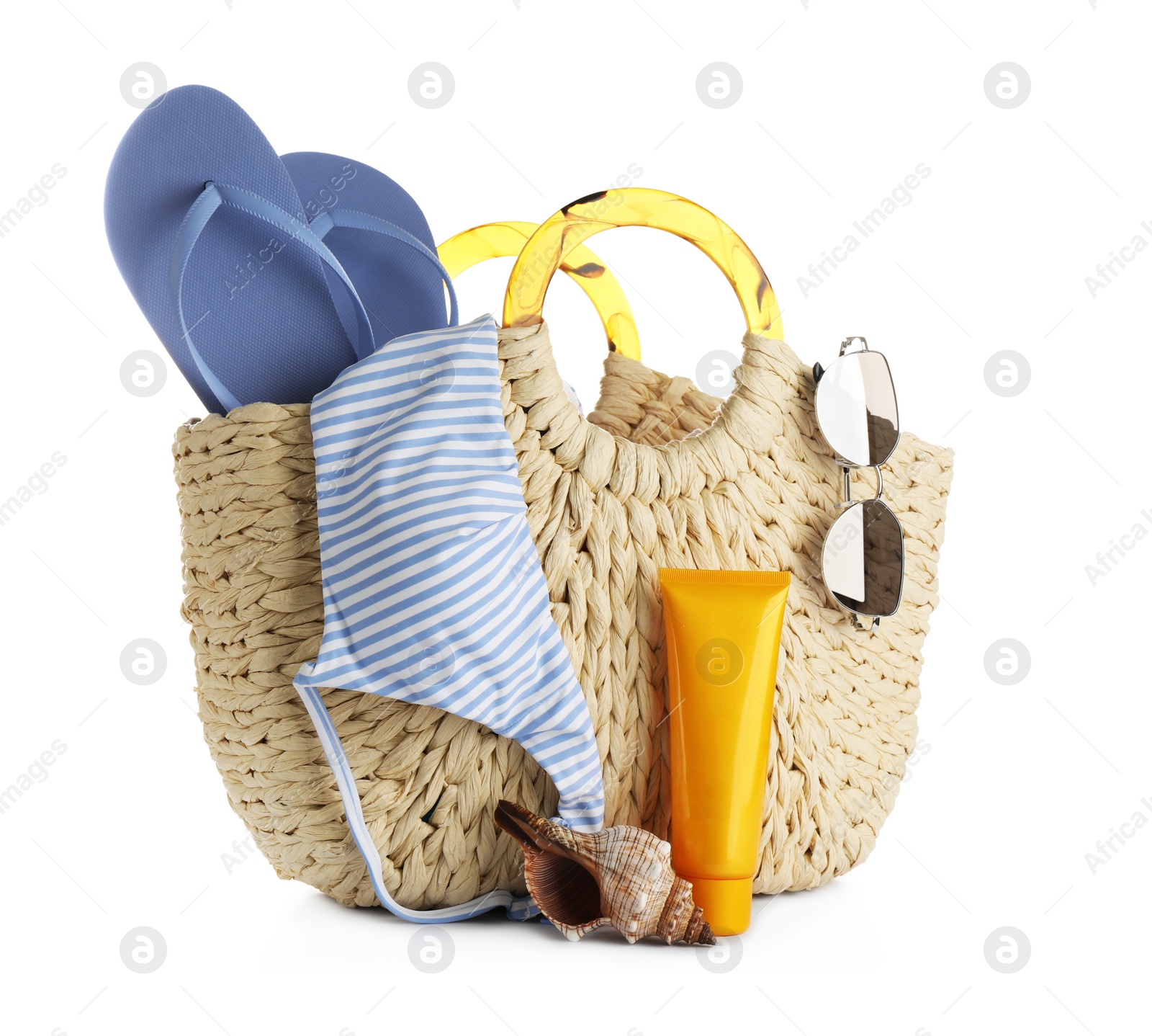 Photo of Different stylish beach accessories on white background