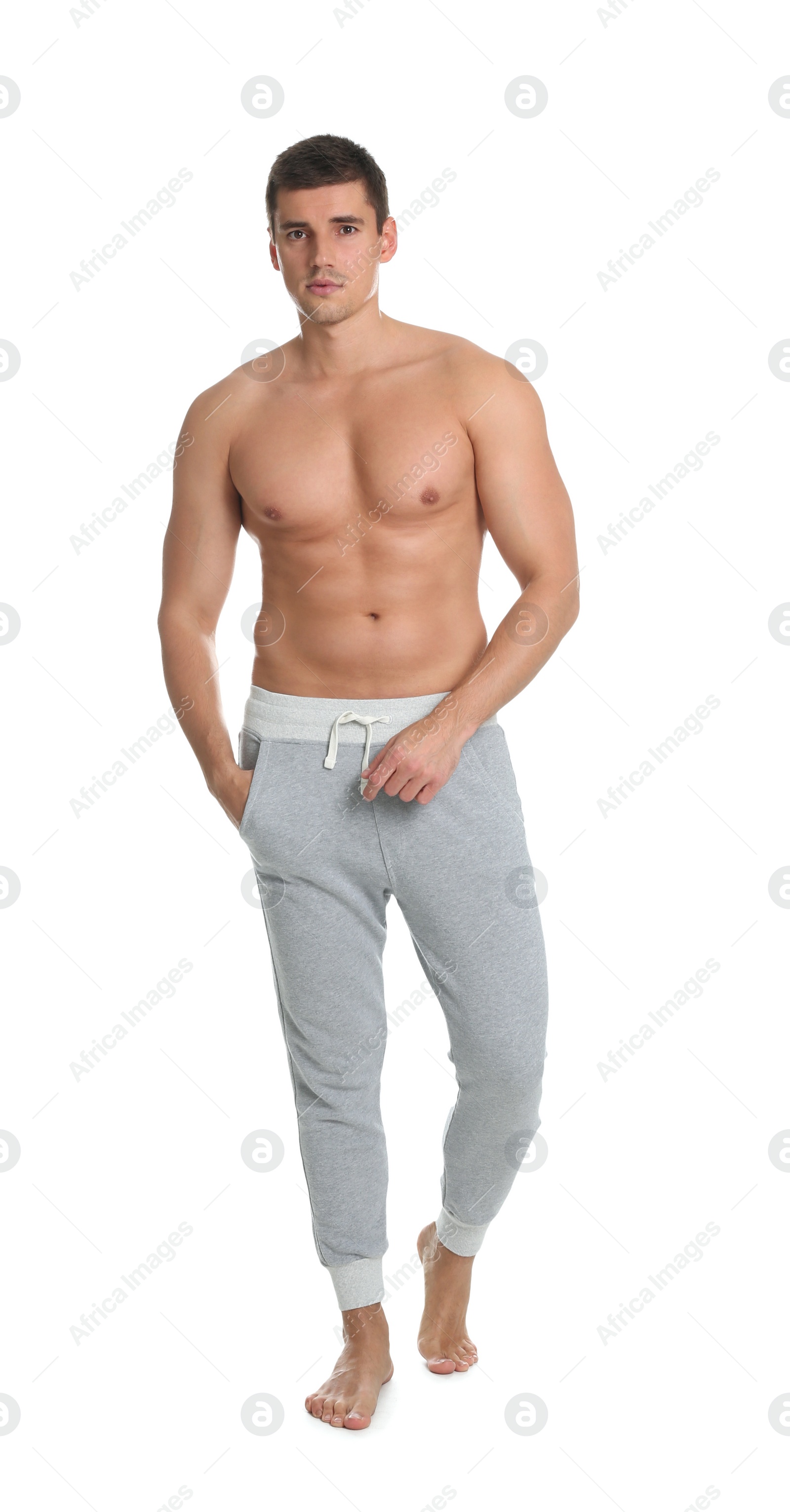 Photo of Man with sexy body on white background