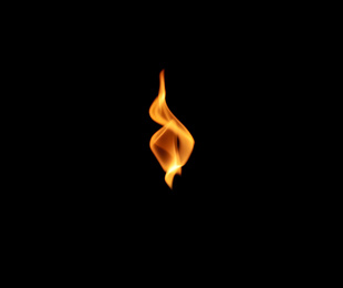 Photo of Beautiful bright fire flame on black background