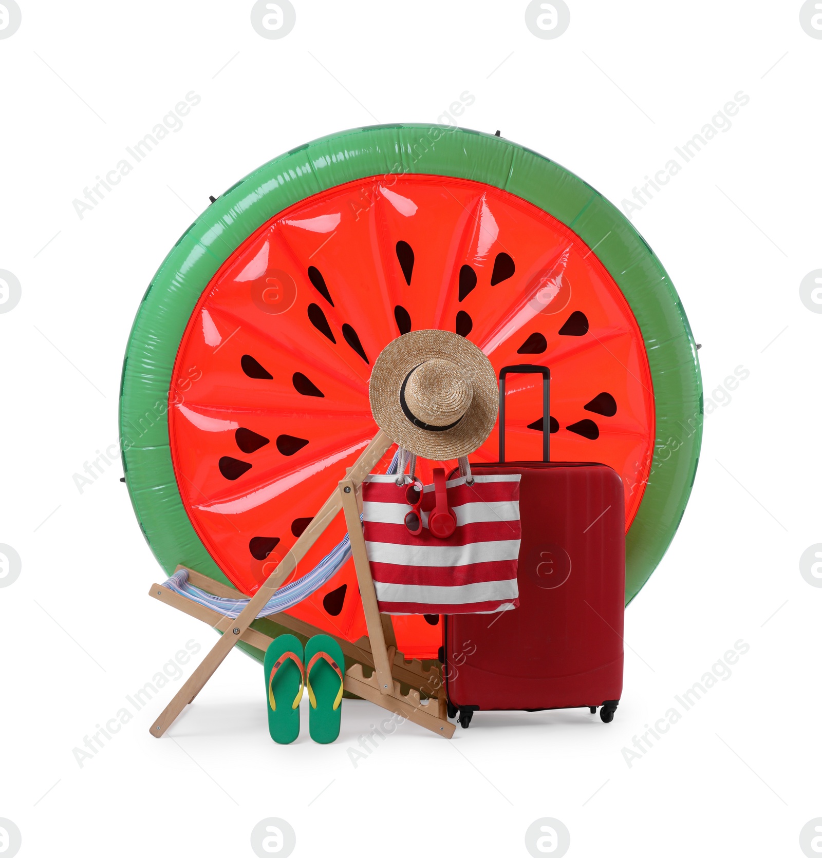 Photo of Deck chair, inflatable mattress and other beach accessories isolated on white