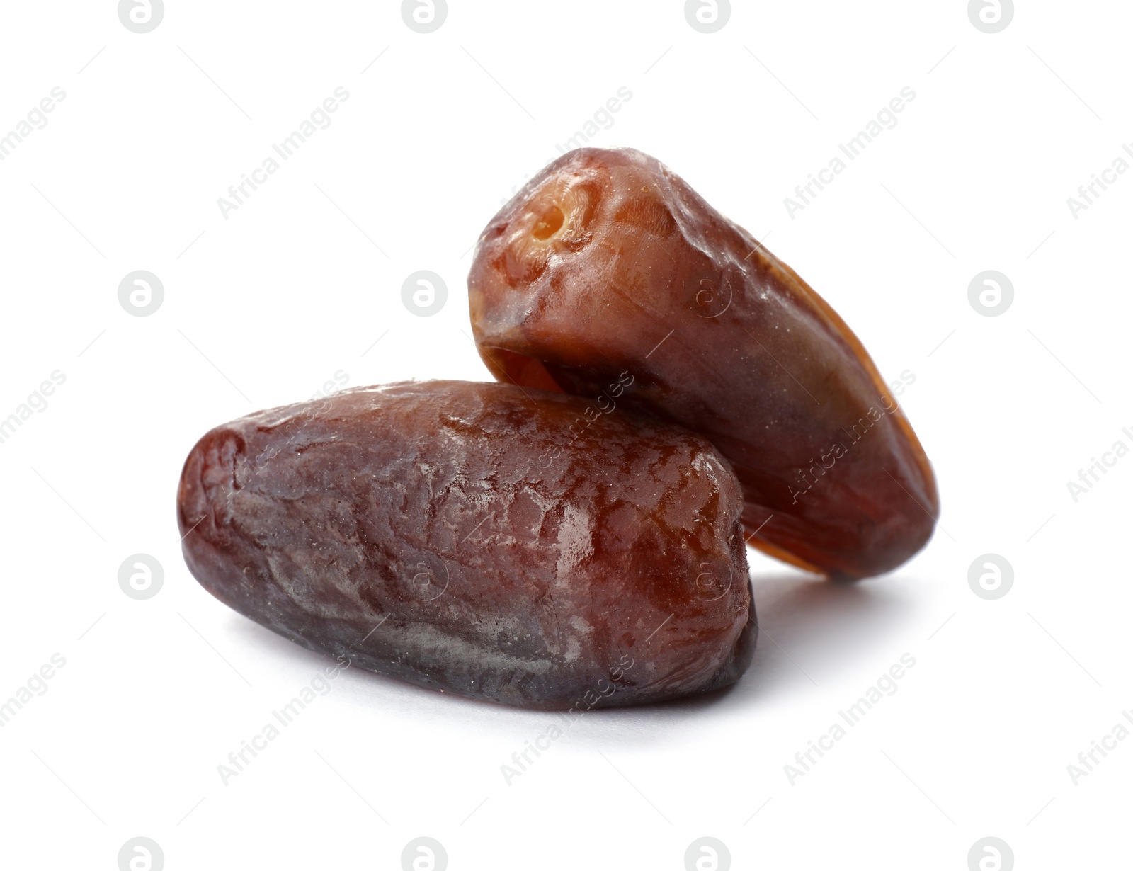 Photo of Sweet dates on white background. Dried fruit as healthy snack