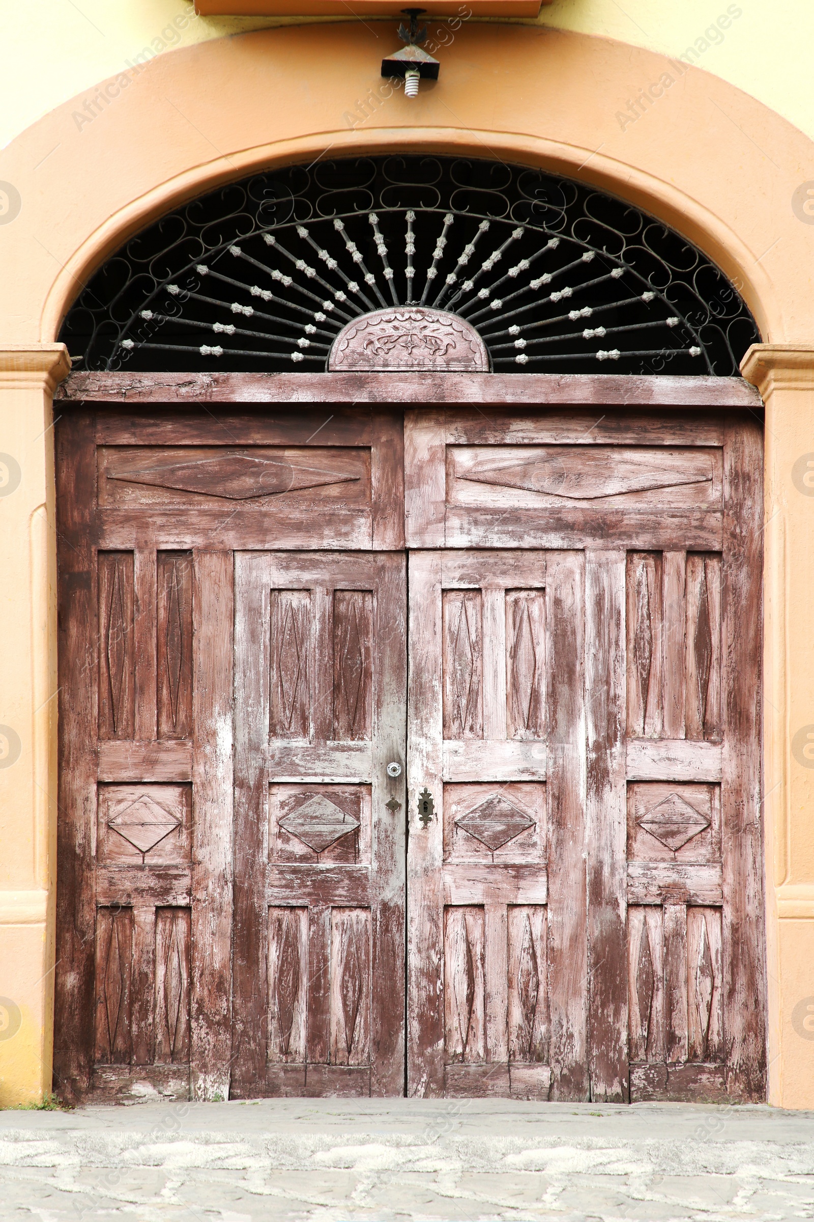 Photo of Exterior of building with old wooden gates