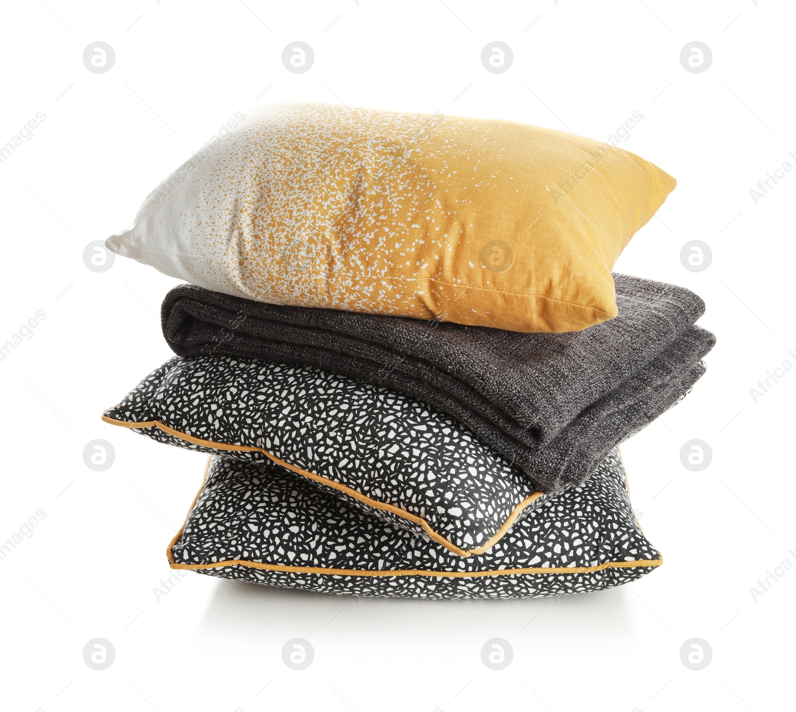 Photo of Stylish soft pillows and folded plaid on white background