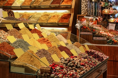 Photo of Assortment of colorful aromatic spices and teas at market