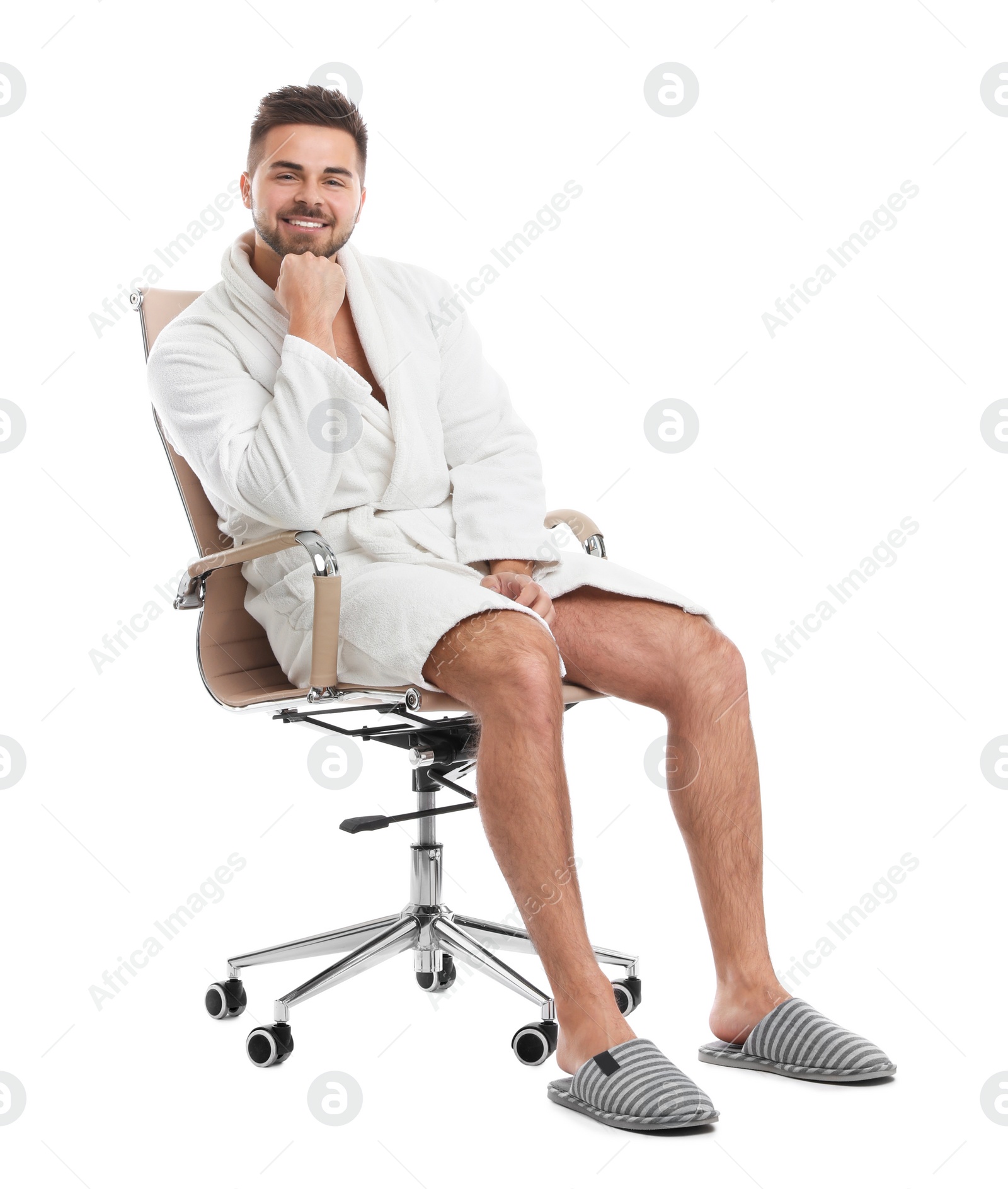 Photo of Handsome man wearing bathrobe on white background