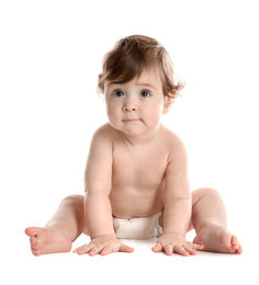 Photo of Cute little baby in diaper on white background