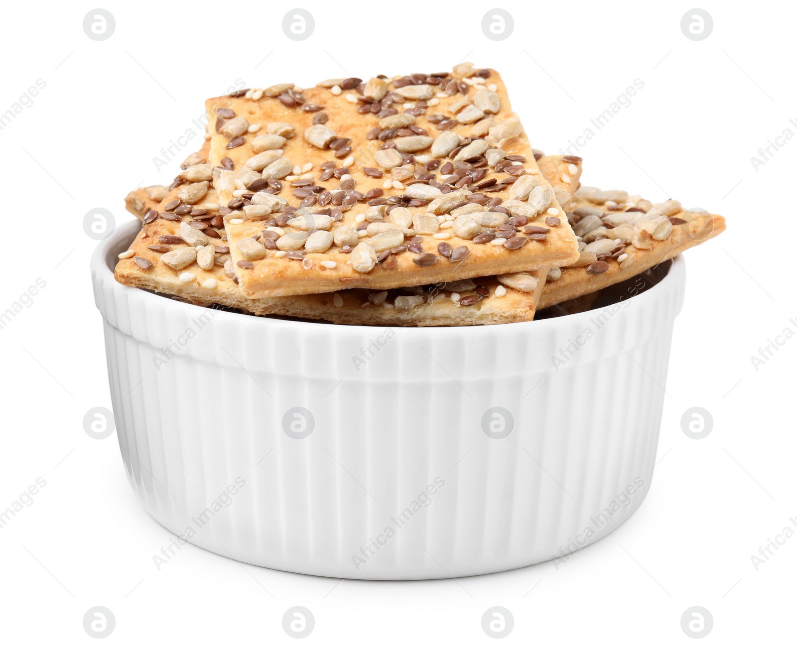 Photo of Cereal crackers with flax, sunflower and sesame seeds in bowl isolated on white