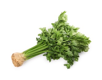 Photo of Fresh raw celery root with stalks isolated on white, top view