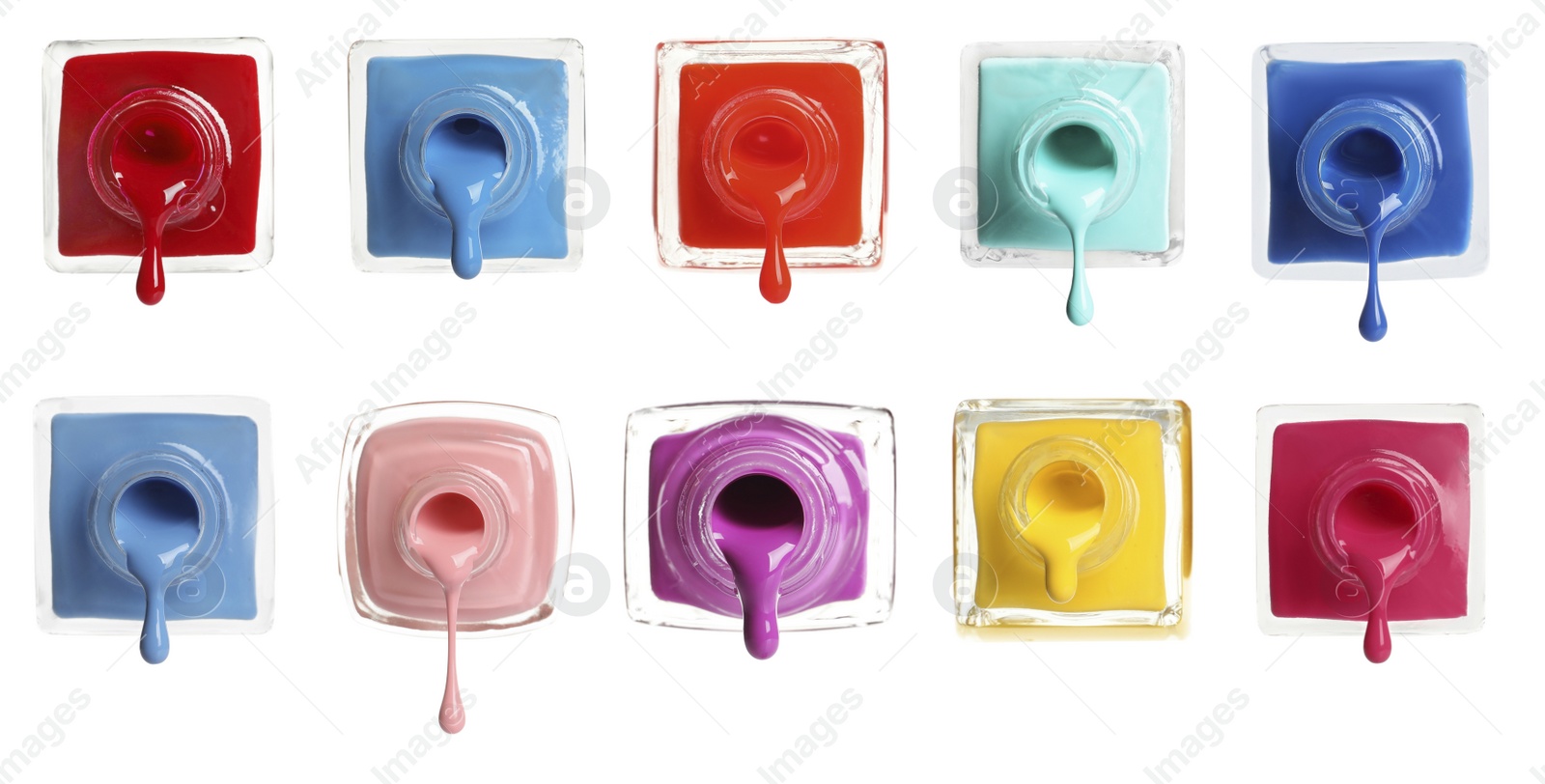 Image of Set of different nail polishes dripping on white background