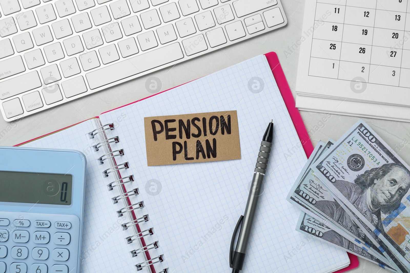 Photo of Card with words Pension Plan, banknotes, calculator and notebook on white office table, flat lay