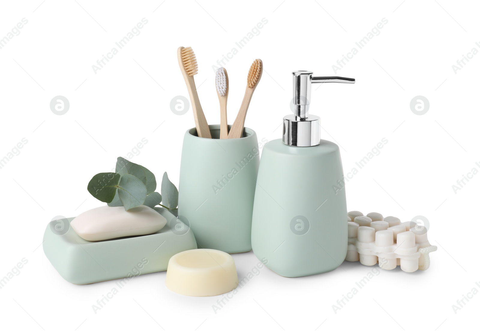 Photo of Bath accessories. Different personal care products and eucalyptus branch isolated on white