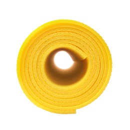 Photo of Rolled yellow camping mat isolated on white
