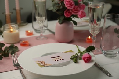 Photo of Romantic table setting with flowers and candles