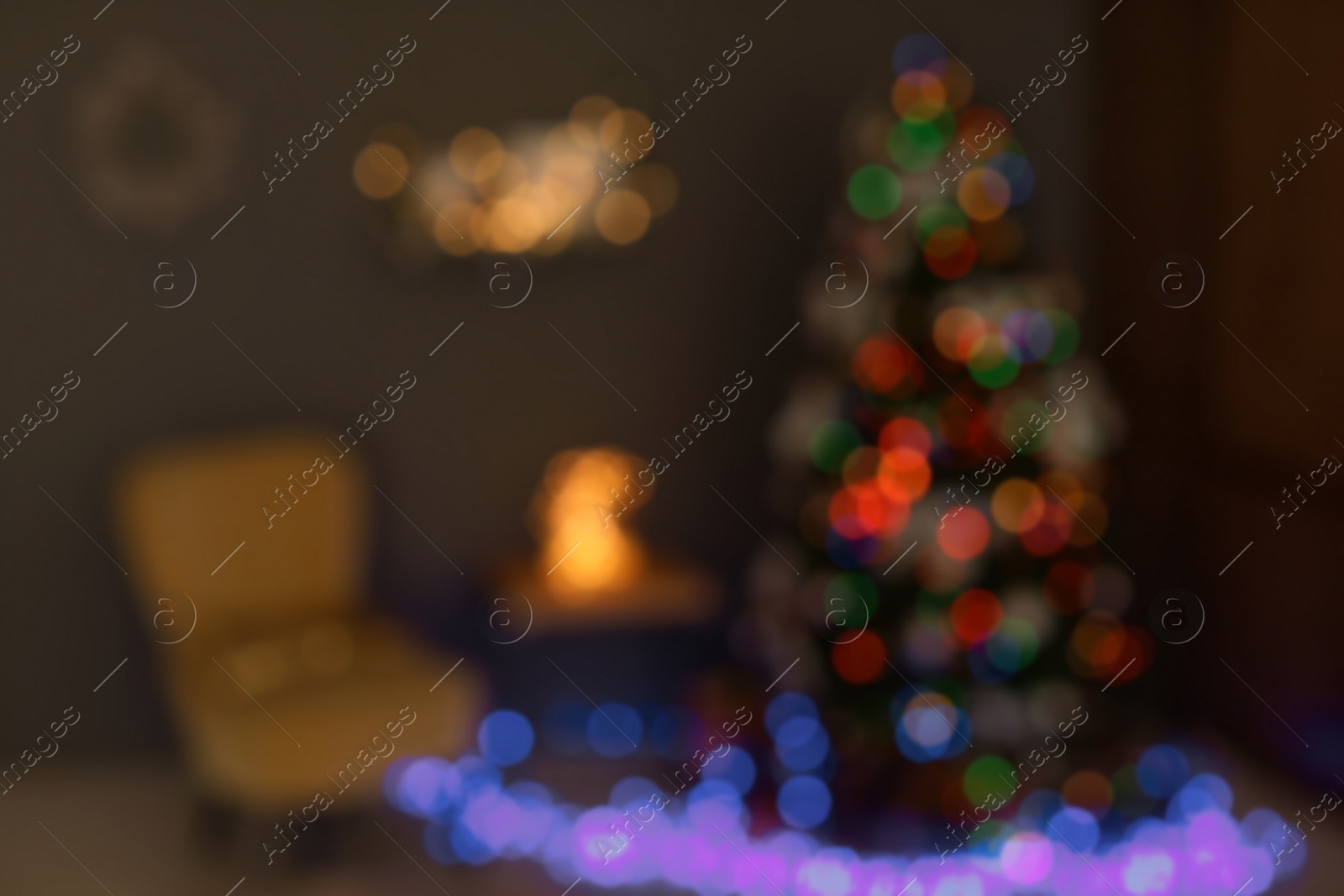 Photo of Blurred view of room with beautiful Christmas tree