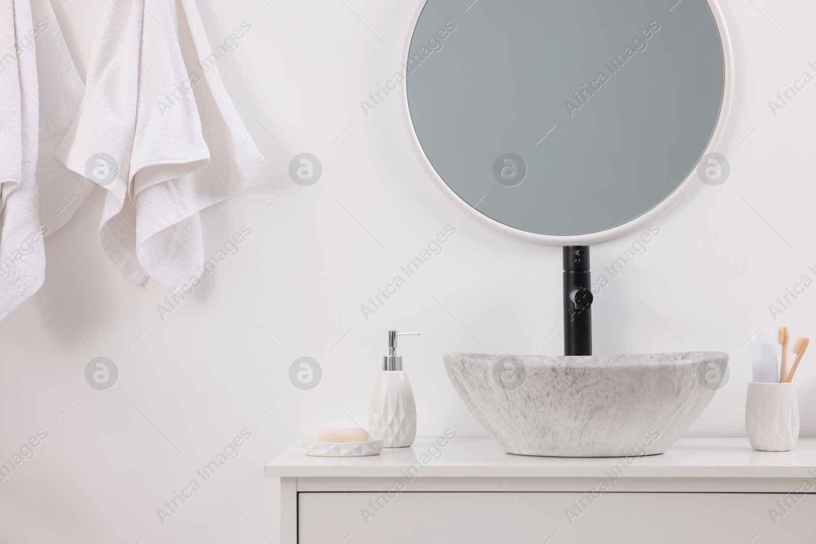 Photo of Different bath accessories and personal care products in bathroom