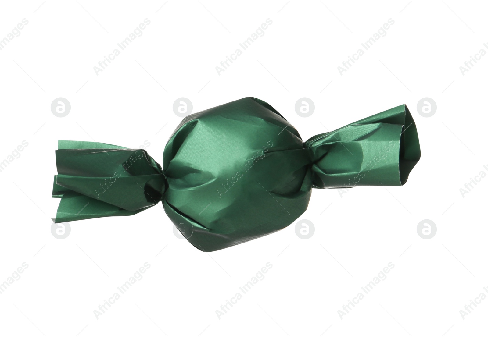 Photo of Delicious candy in dark green wrapper isolated on white
