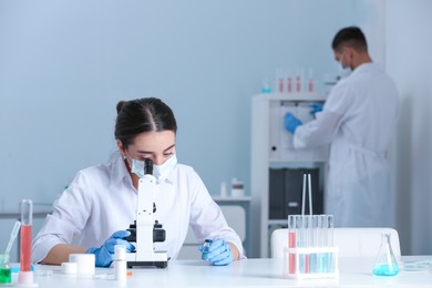 Photo of Scientists working in chemical laboratory. Research and analysis