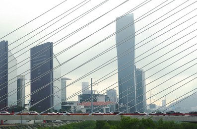 View of beautiful city from modern bridge