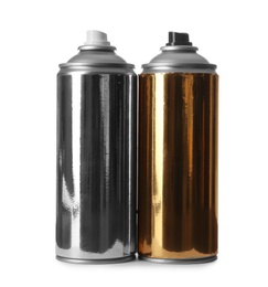 Cans of different spray paints on white background