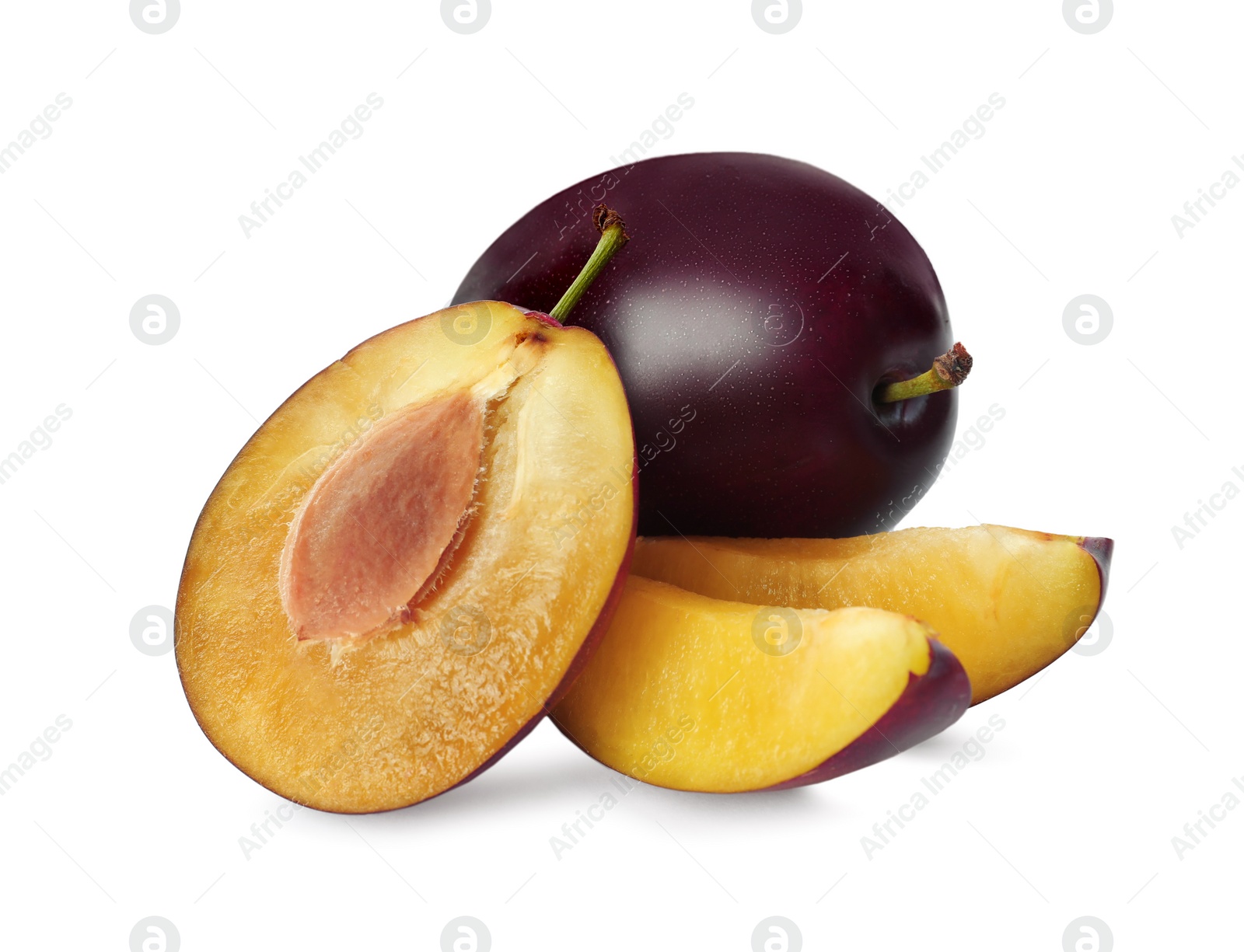 Photo of Whole and cut ripe plums on white background