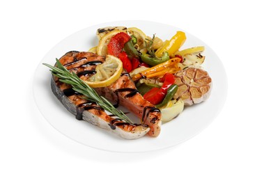 Photo of Tasty salmon steak with sauce, lemon and vegetables on white background