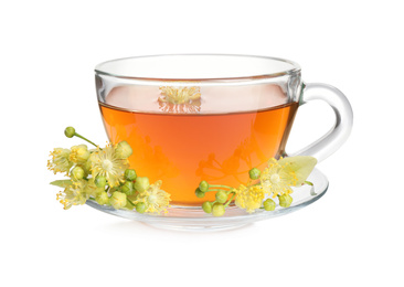 Photo of Cup of tea and linden blossom on white background