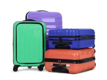 Image of Stylish suitcases packed for travel on white background