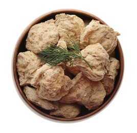 Photo of Dehydrated soy meat chunks with dill in bowl on white background, top view