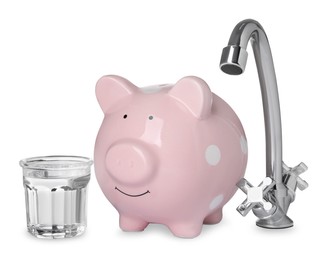 Photo of Water scarcity concept. Piggy bank, tap and glass of drink on white background