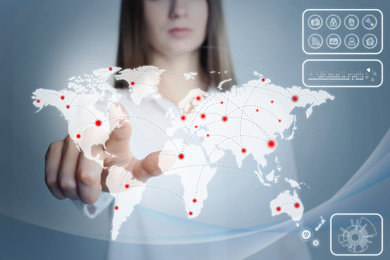 Image of Travel agency services. Woman touching world map on virtual screen