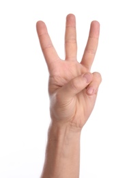 Photo of Man showing three fingers on white background, closeup of hand