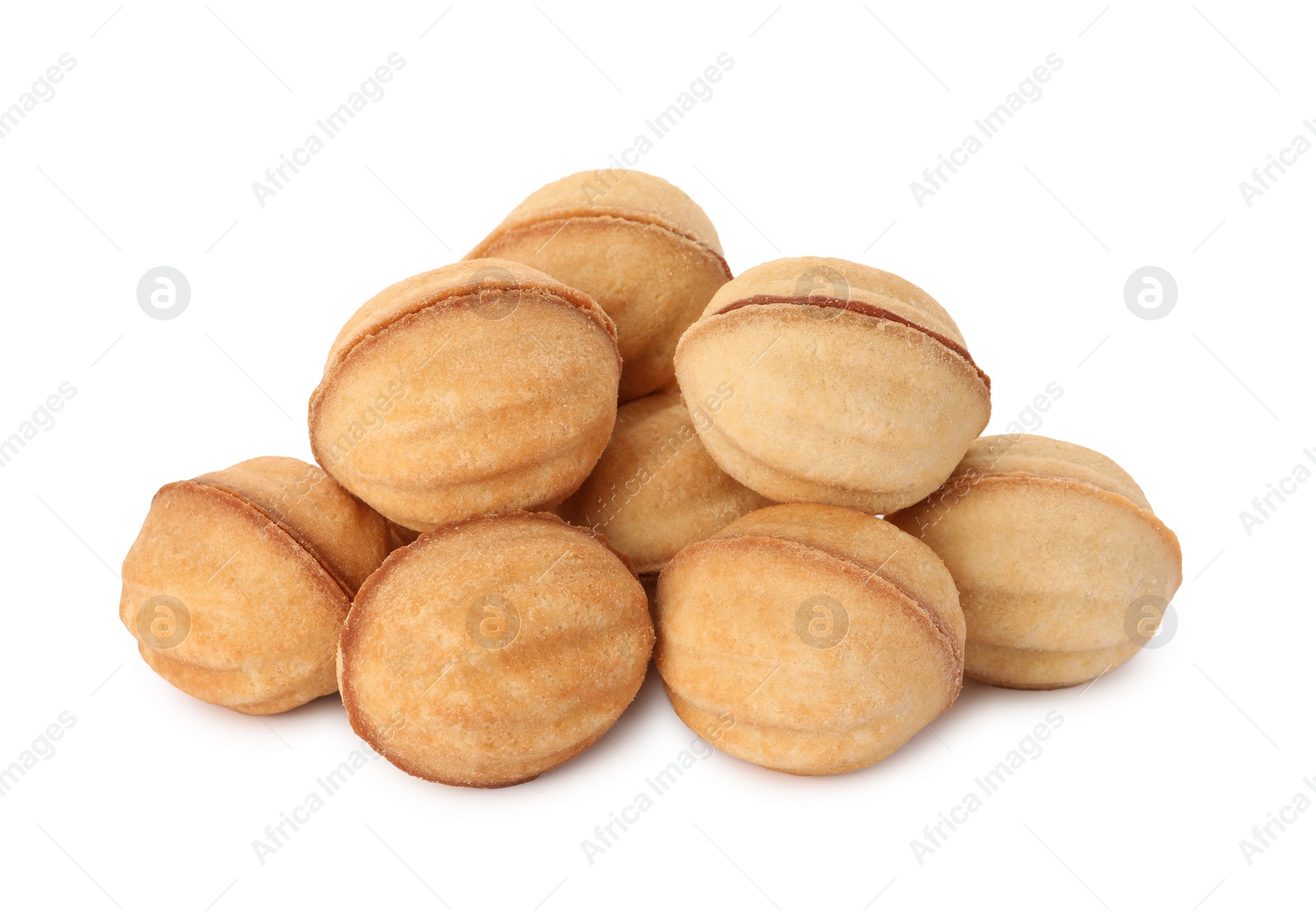 Photo of Delicious nut shaped cookies with condensed milk on white background