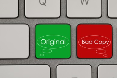 Buttons with words Bad Copy and Original on keyboard, top view. Plagiarism concept